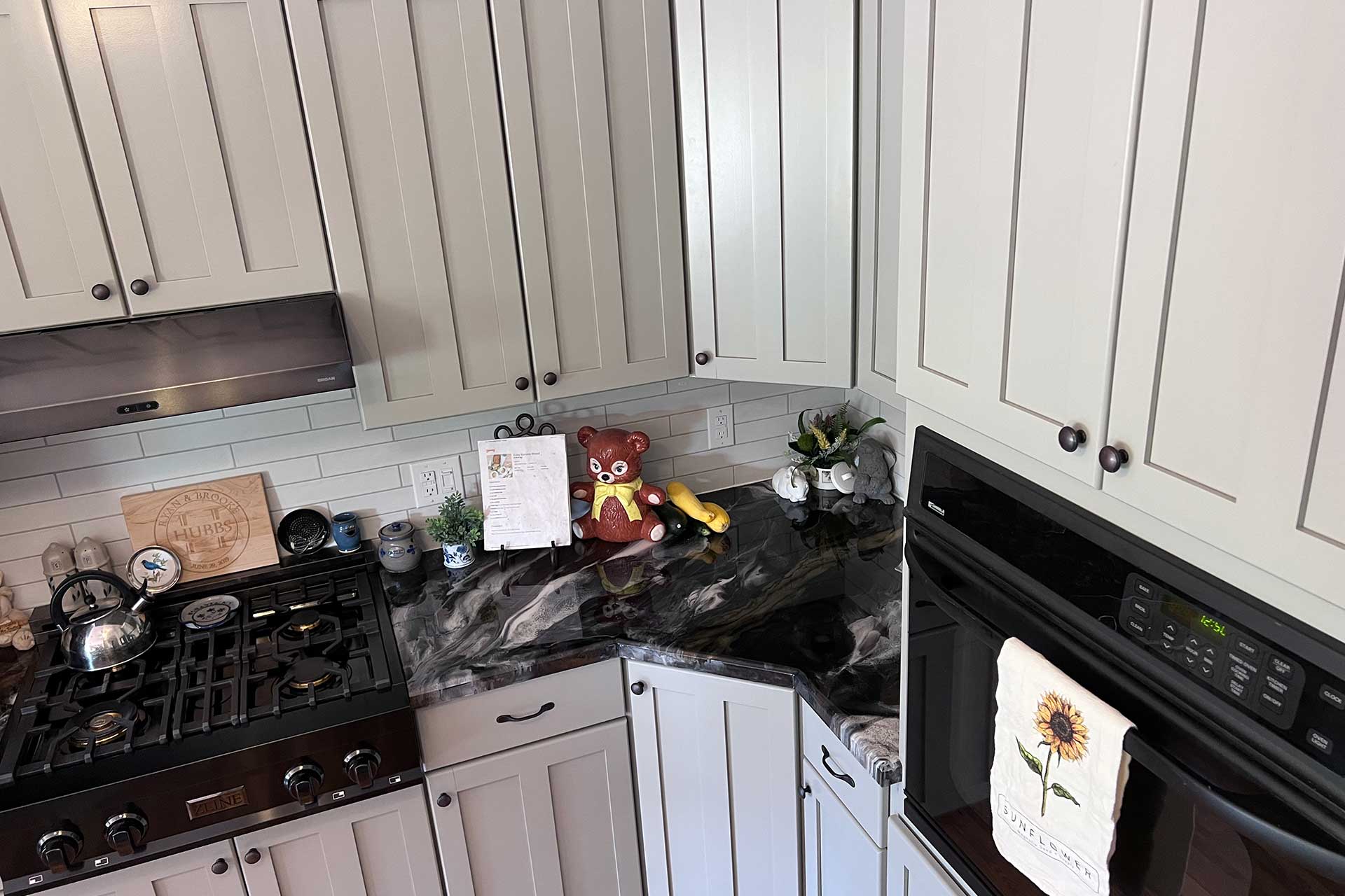 Kitchen with freshly painted cabinets by Patrick's Painting LLC
